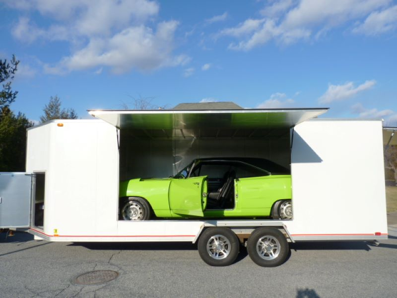Classic muscle car loaded in CTE-80210HD enclosed trailer, side view